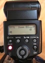Canon 430 flash showing ETTL and Zoom settings.