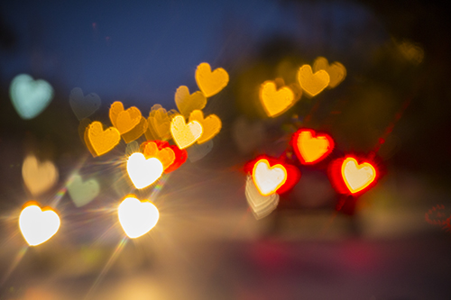 Heart-sharped bokah, bokeh, blown out background, blurry background.